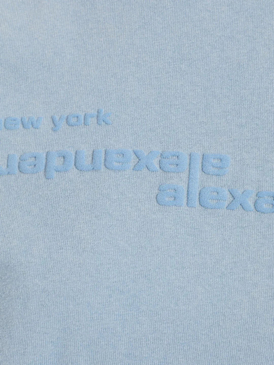 Close up of Blue top, showing texture of the 100% cotton fabric