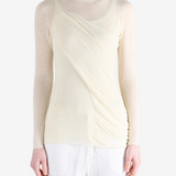 Tan top worn by a person, showing the top fit