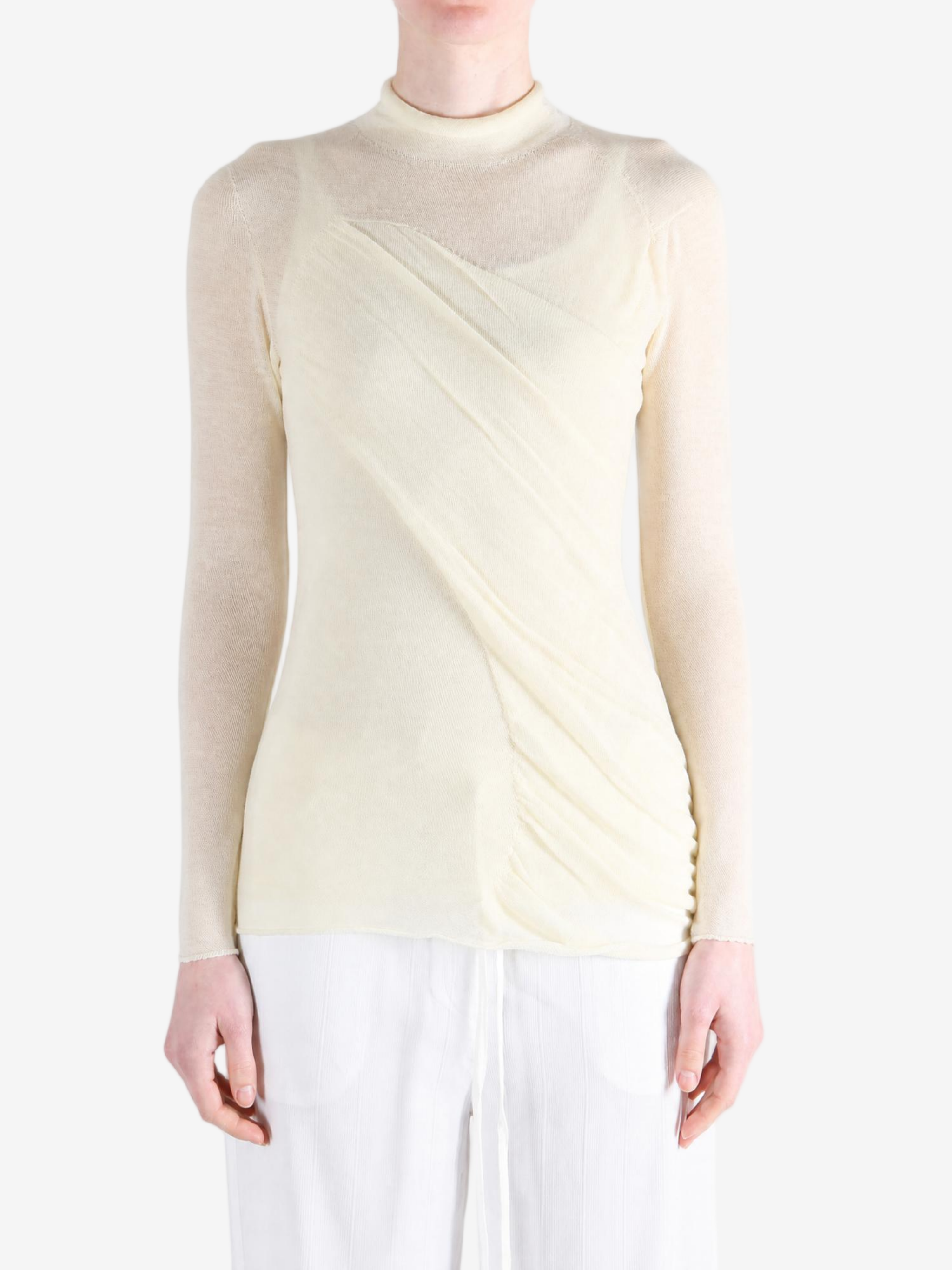 Tan top worn by a person, showing the top fit