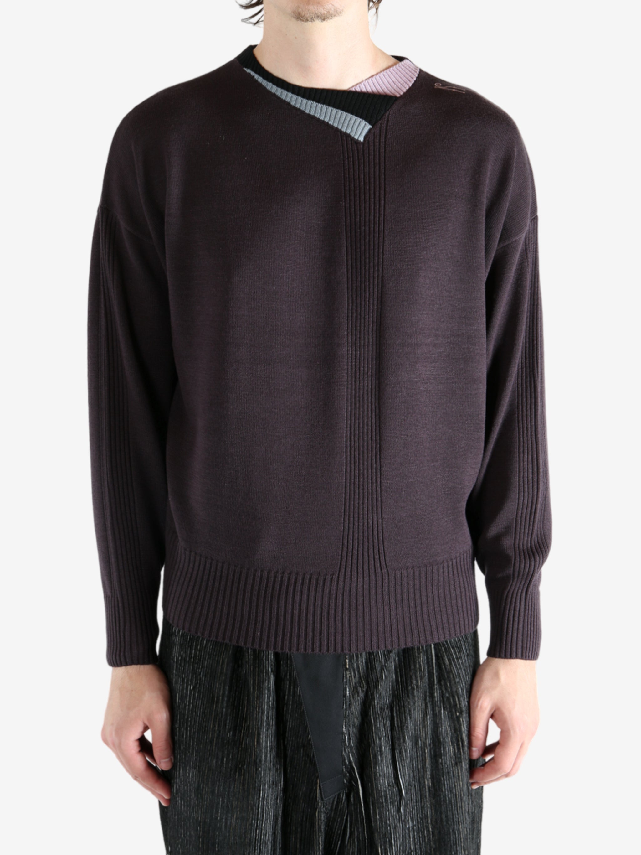 Brown top worn by a person, showing the top's fit