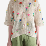 Tan shirts worn b a perosn, showing the shirt's fit