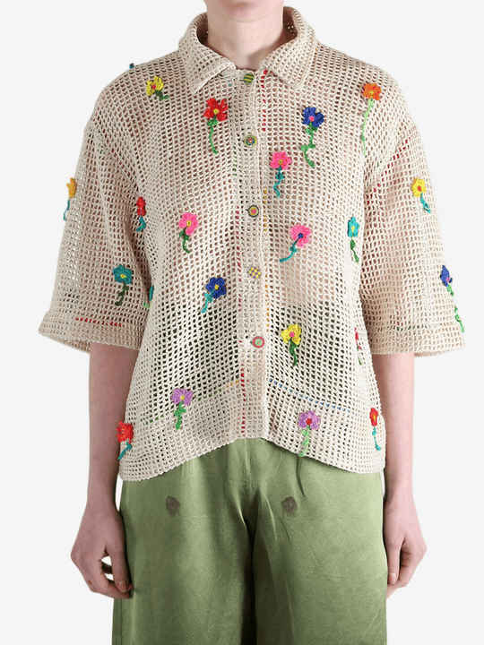 Tan shirts worn b a perosn, showing the shirt's fit