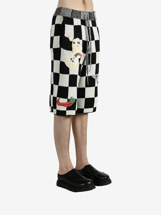 Black shorts worn by a person, showing the shorts’ fit