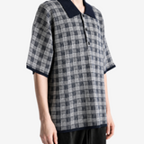 Navy shirt worn by a person, showing the shirt fit