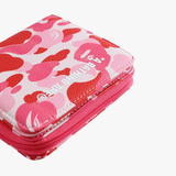 Close up of pink small-accessories, showing texture of the fabric