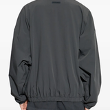 grey jacket worn by a person, showing the  jacket fit