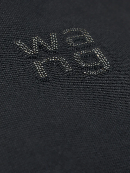 Close up of black sweatshirt,showing texture of the cotton fabric.