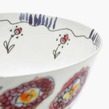 Close up of blue bowl, showing texture of the bone porcelain fabric