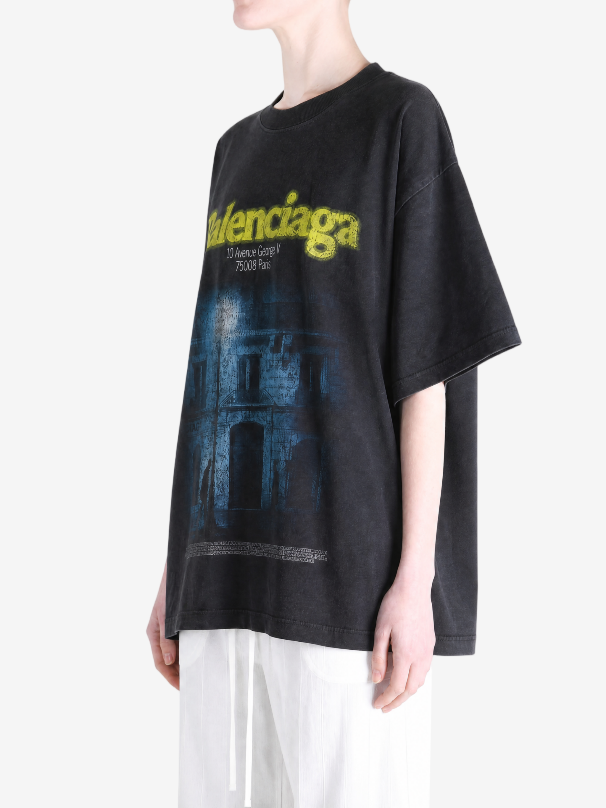 Black t-shirt worn by a person, showing the t-shirt fit