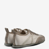 Grey sneakers, back view