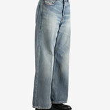 Blue jeans worn by a person, showing the jeans fit