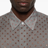 Close up of grey shirt, showing texture of the cotton fabric