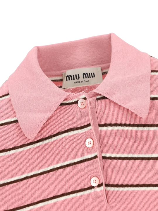 Close up of pink shirt, showing texture of the Cotton fabric