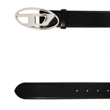 Close up of black belt,showing texture of the leather fabric.