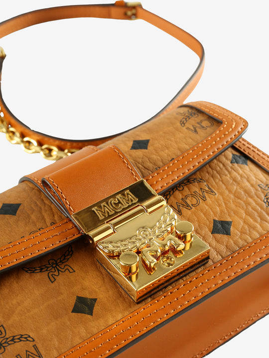 Close up of brown bag, showing texture of the leather  fabric