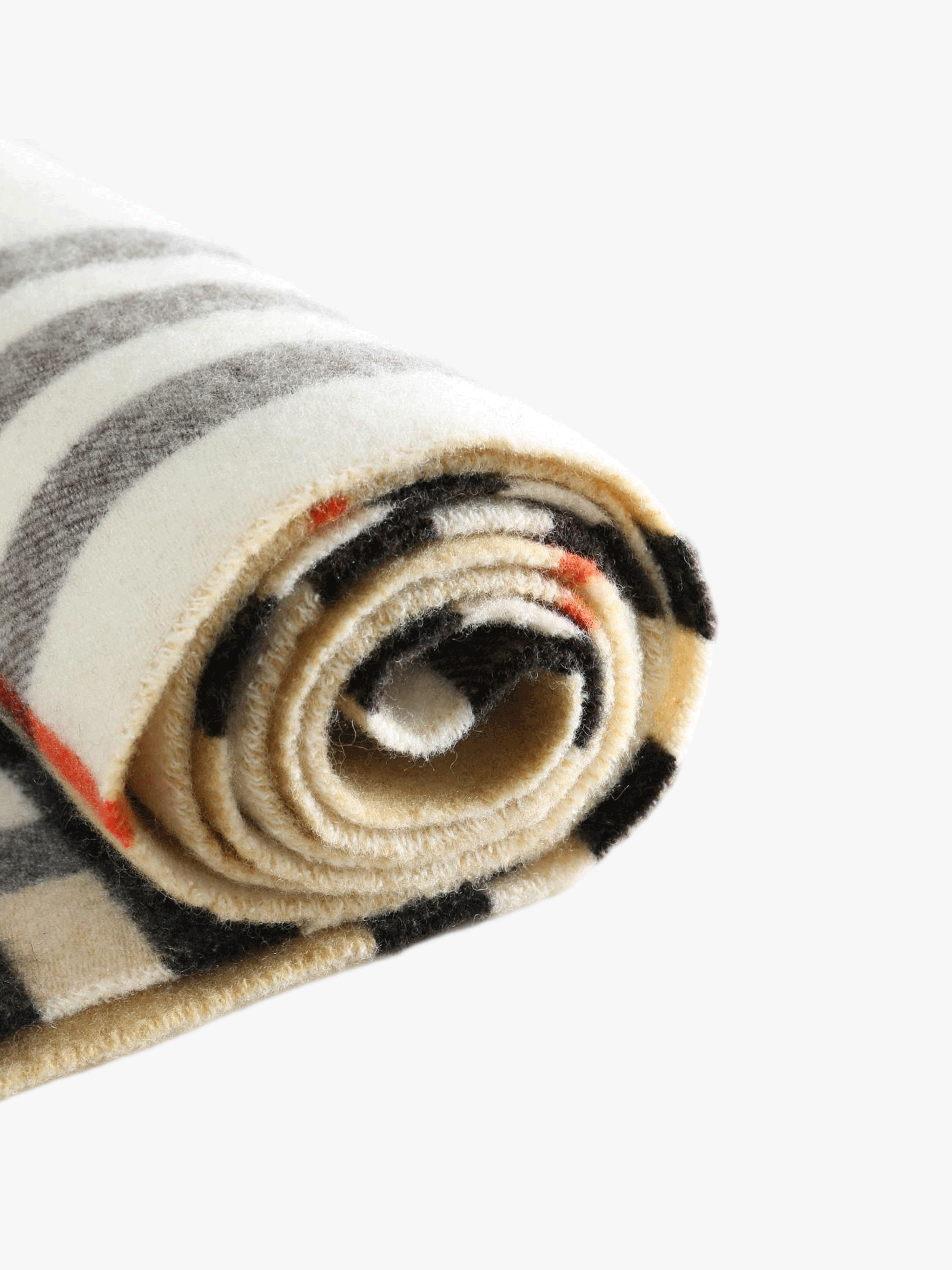 Close up of the tan scarf, showing texture of the cashmere fabric