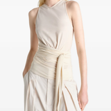 Tan top worn by a person, showing the top fit