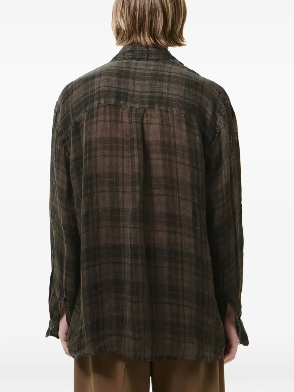 Grey shirt worn by a person, showing the shirt fit