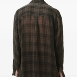 Grey shirt worn by a person, showing the shirt fit