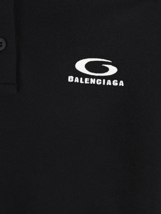 Close up of black t-shirt, showing the texture of the cotton fabric