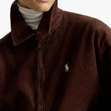 Brown jacket worn by a person, showing the jacket fit