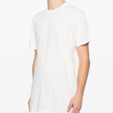 White t-shirt worn by a person, showing the t-shirt fit