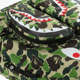 Close up of green bag, showing texture of the nylon fabric