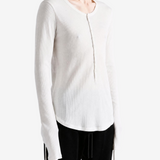 Tan top worn by a person, showing the top fit