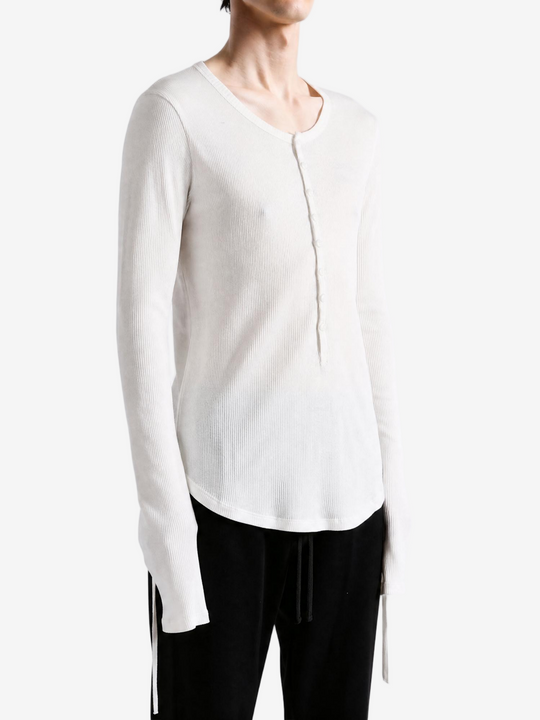 Tan top worn by a person, showing the top fit