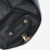 Close up of the black bag, showing texture of the polyester fabric