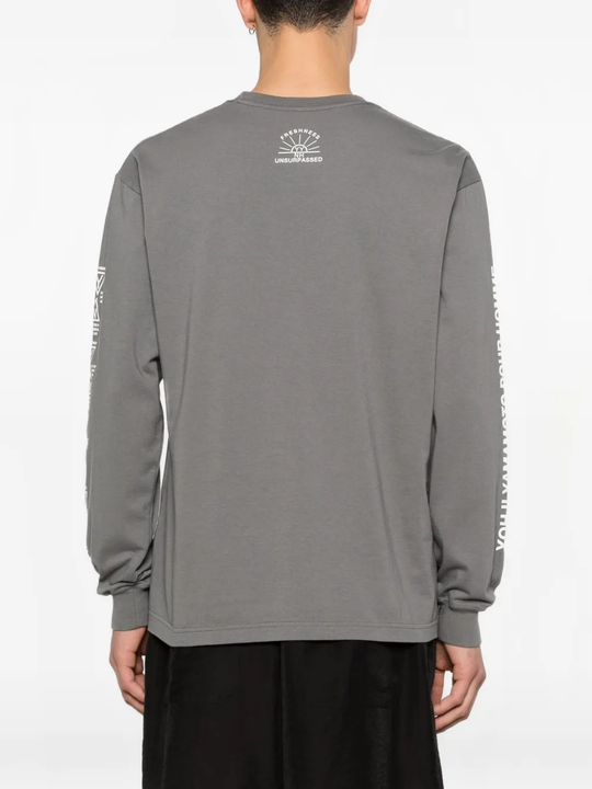 Grey t-shirt worn by a person, showing the t-shirt's fit