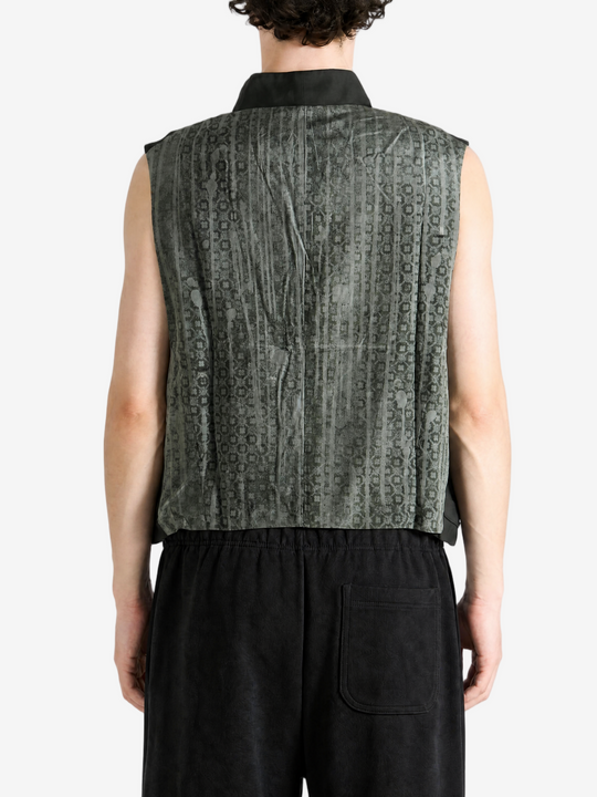 Black jacket worn by a person, showing the jacket fit