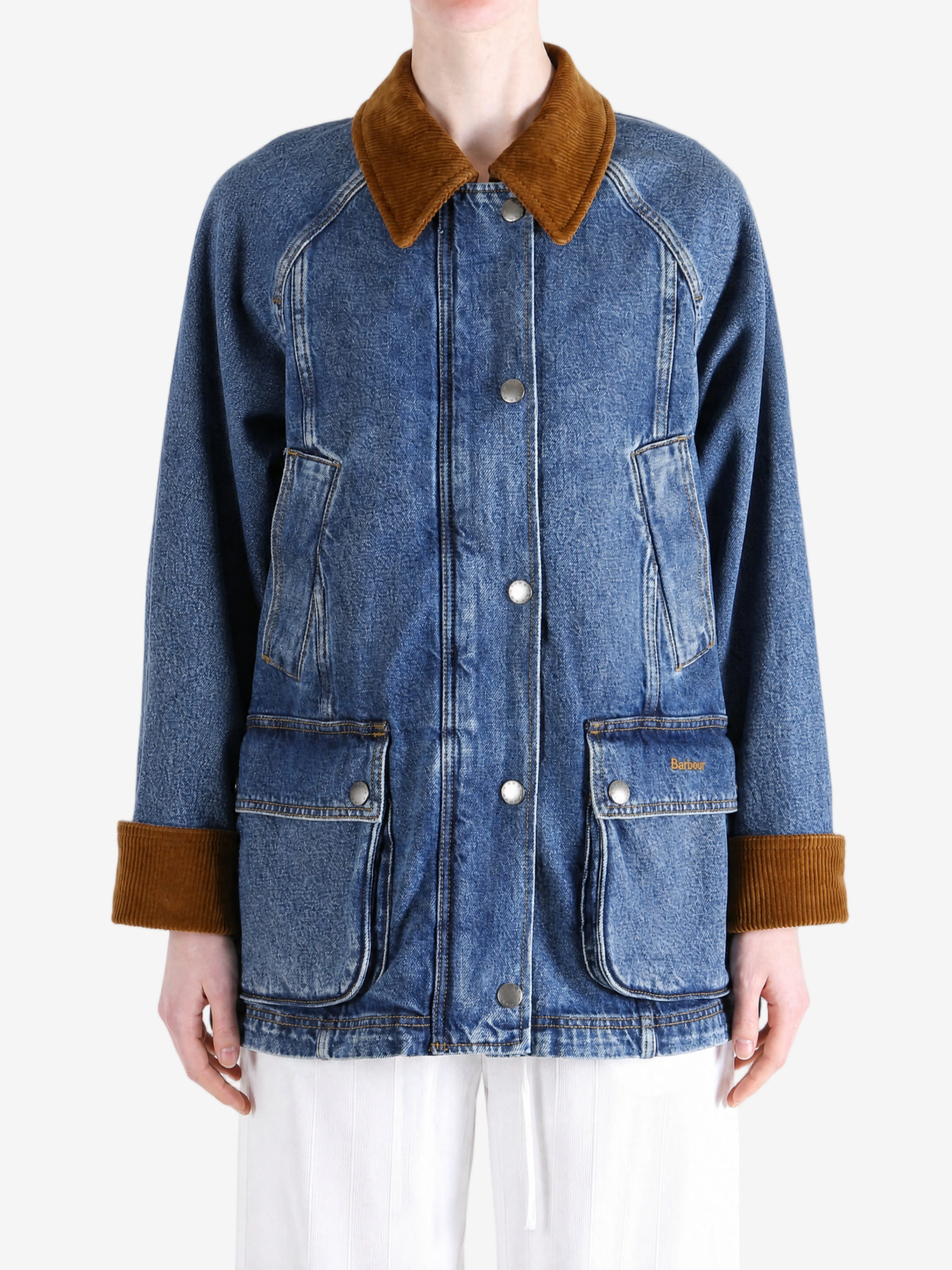 Blue jacket worn by a person, showing the jacket fit