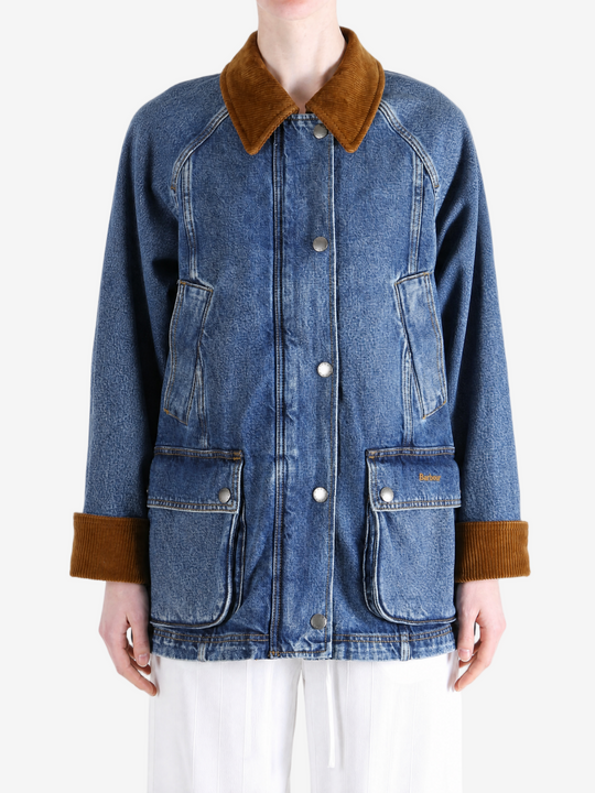 Blue jacket worn by a person, showing the jacket fit