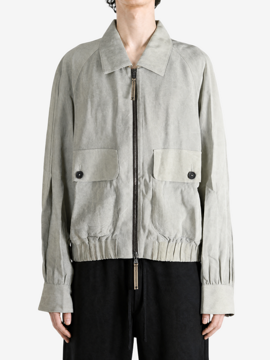 Grey jacket worn by a person, showing the jacket fit