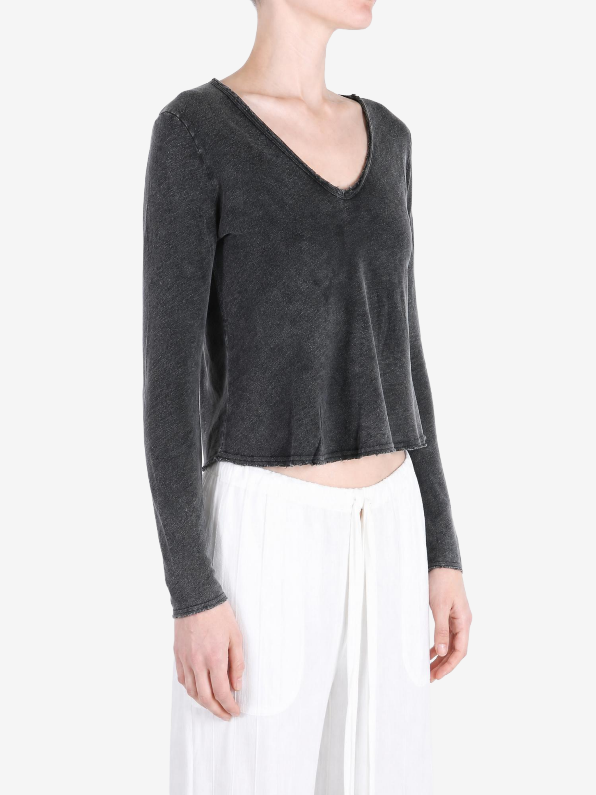 Black t-shirt worn by a person, showing the t-shirt fit