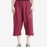 Burgundy pants, full body view