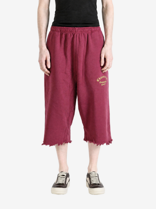 Burgundy pants, full body view