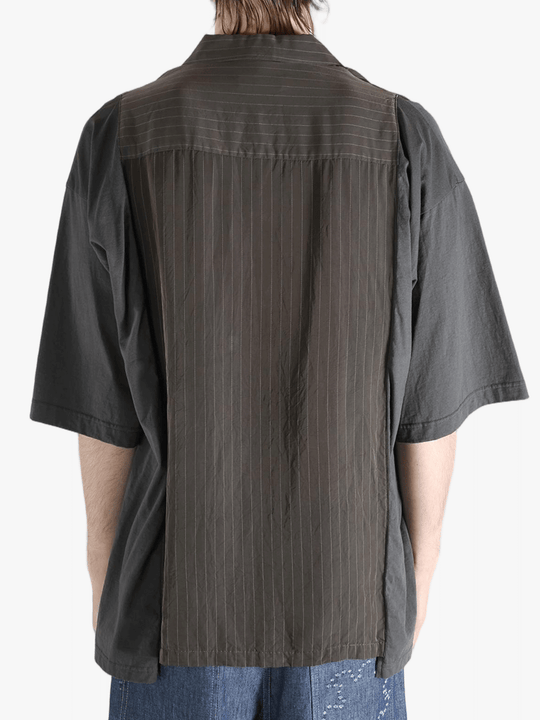 Brown shirt worn by a person, showing the shirt's fit