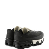 Black sneaker, back view