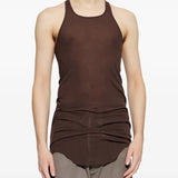 Brown tops worn by a person, showing the tops fit