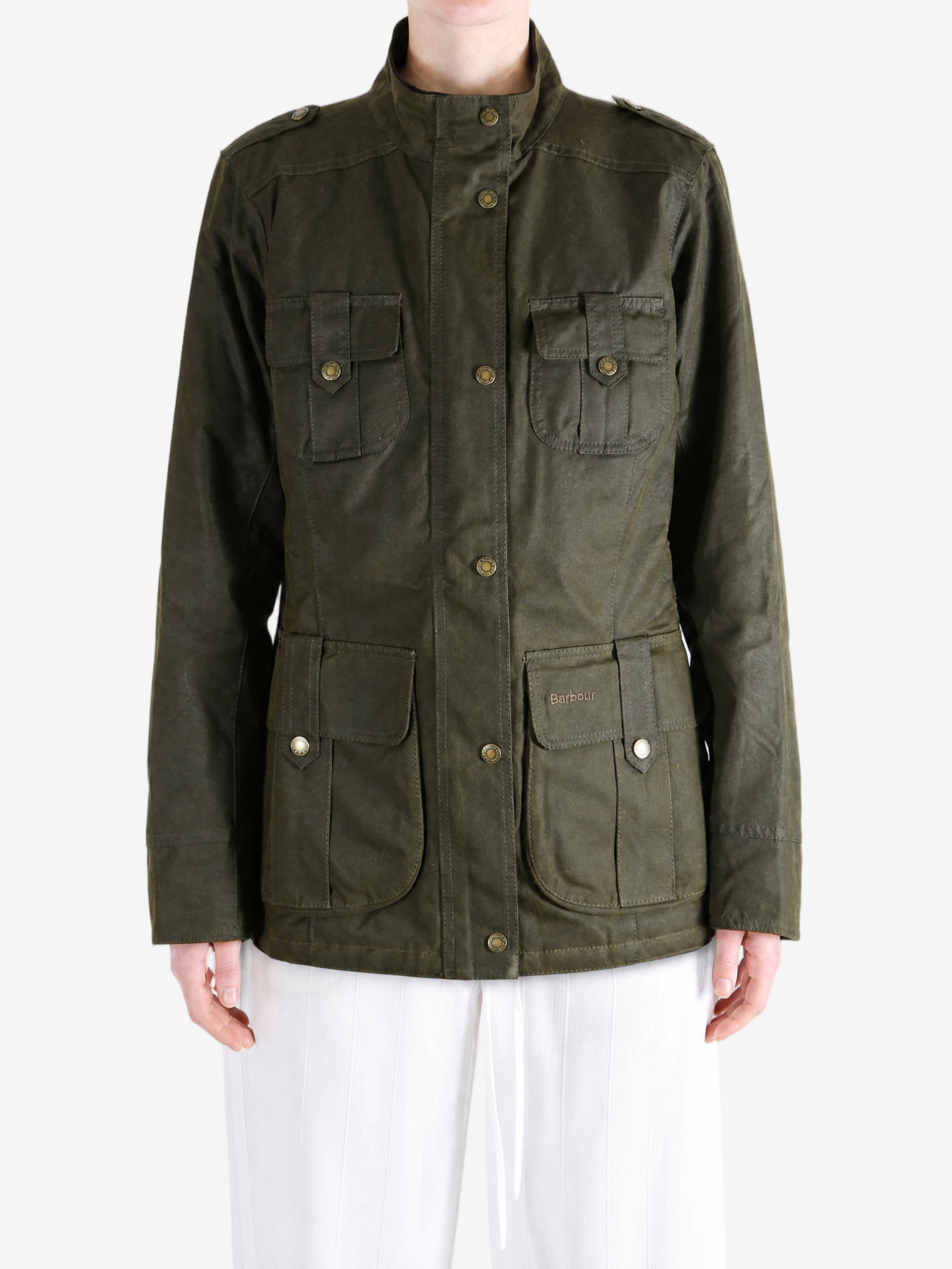 Green jacket worn by a person, showing the jacket fit