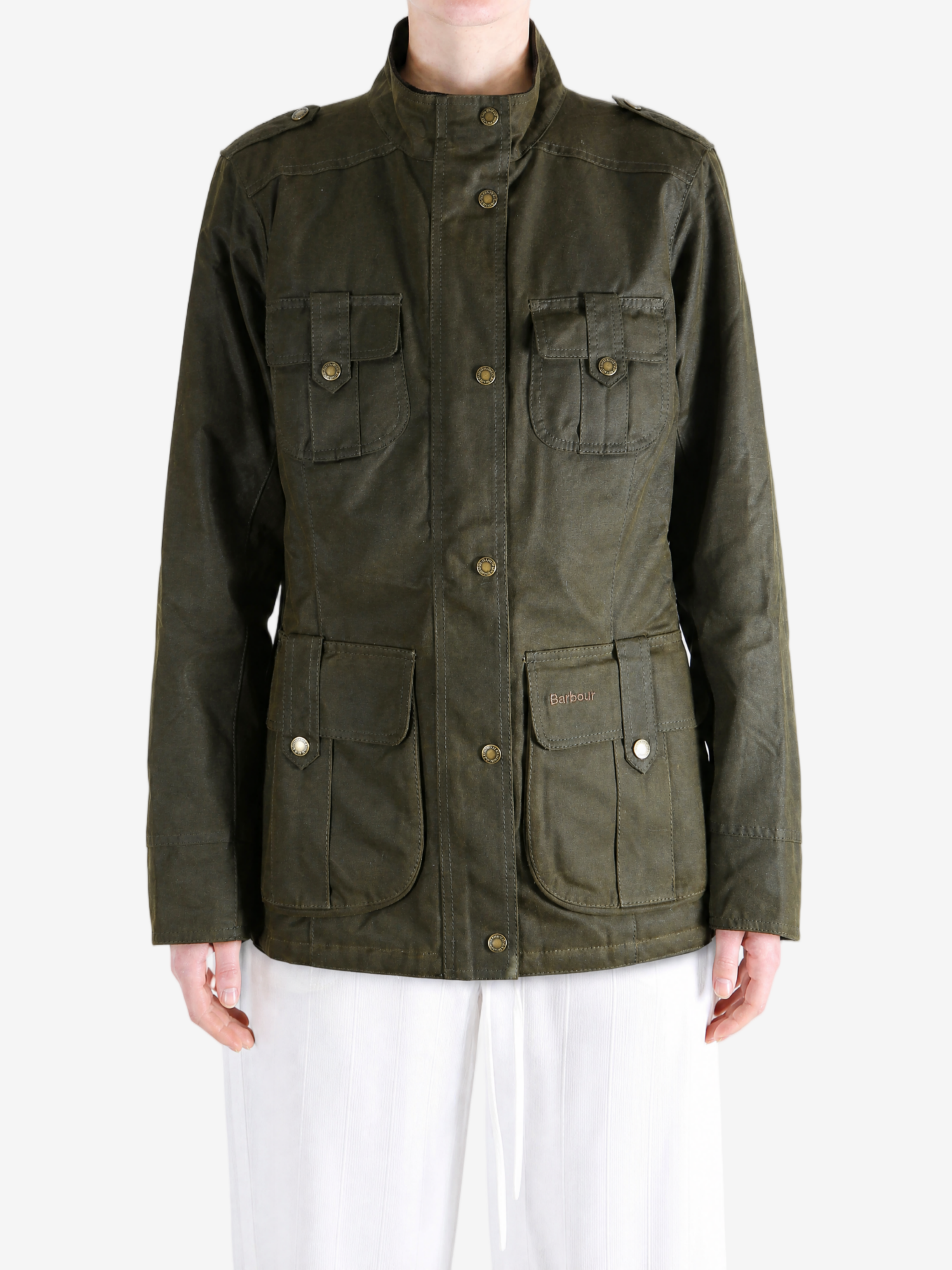 Green jacket worn by a person, showing the jacket fit