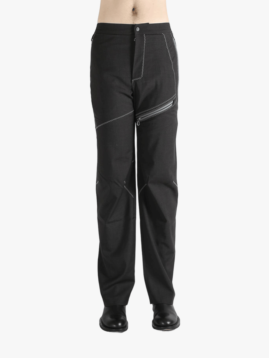 Brown pants worn by a person, showing the pants fit