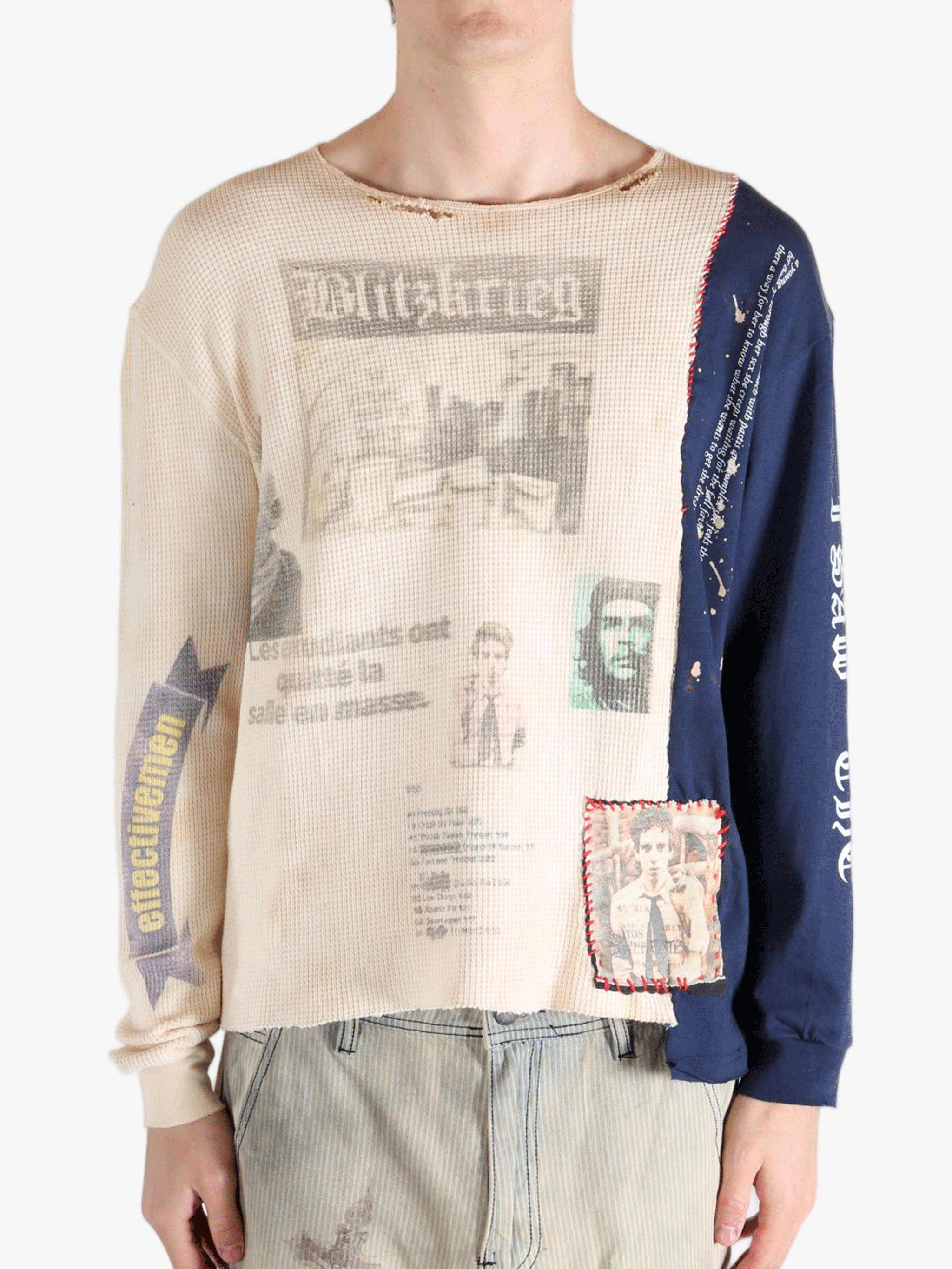 White knitwear worn by a person, showing the knitwears fit