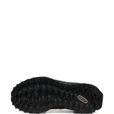 Close up of orange sneakers, showing texture of the mesh and rubber fabric