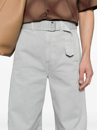 Close up of grey pants, showing texture of the cotton fabric.