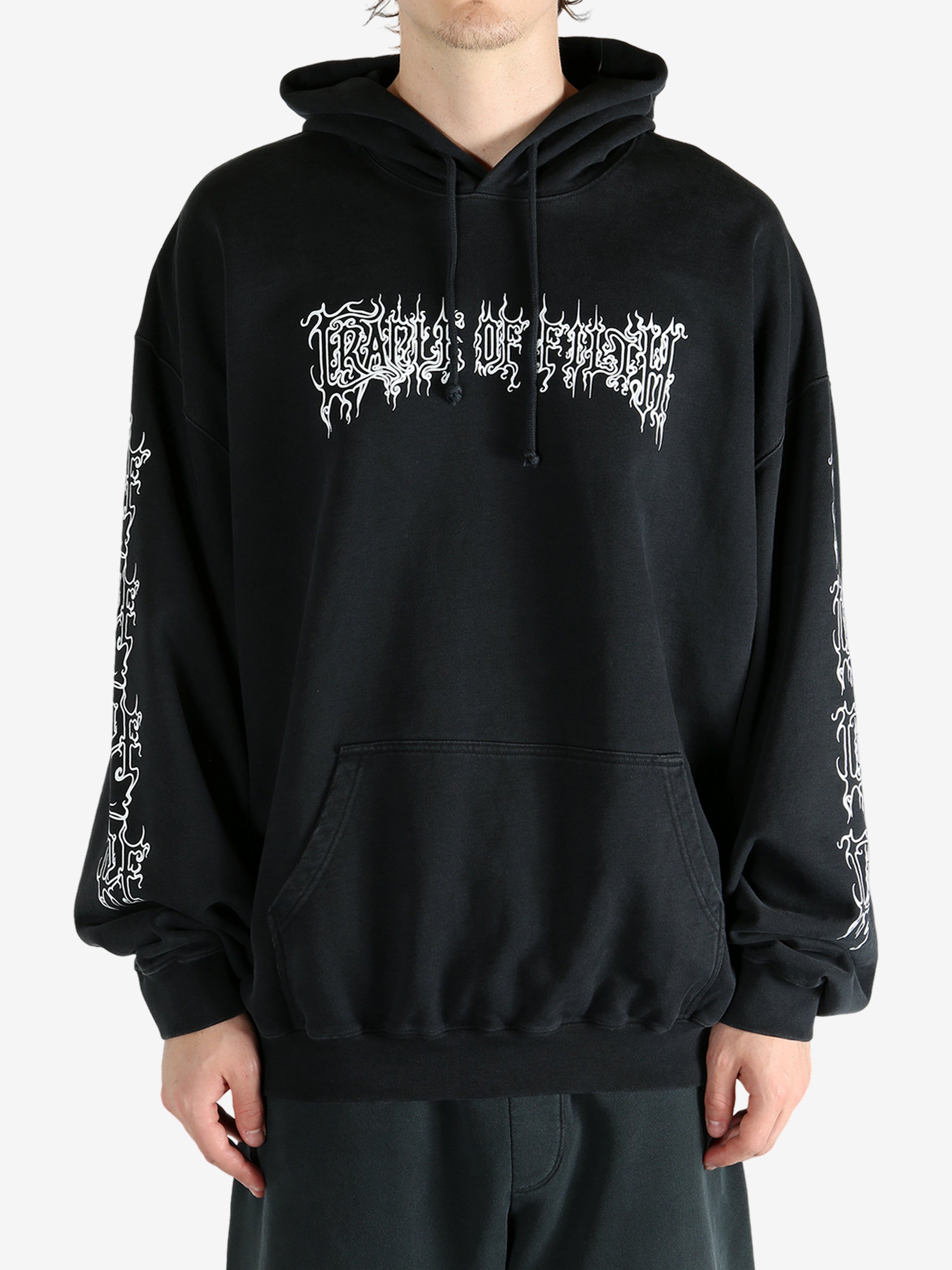 Black hoodie worn by a person, showing the hoodie's fit