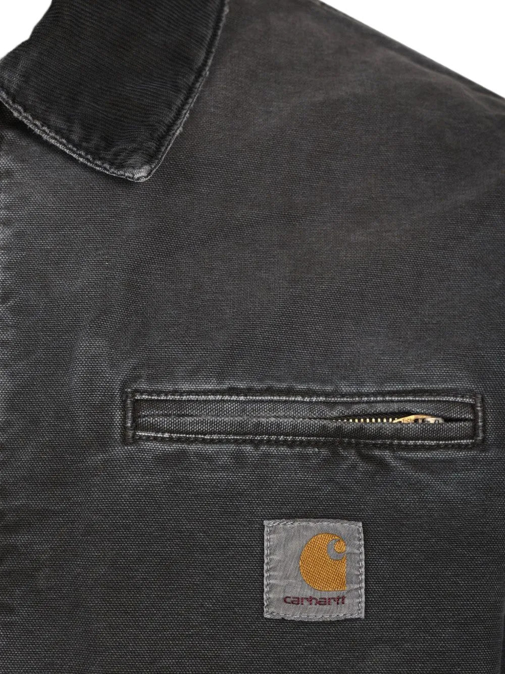 Close up of Black jacket, showing texture of the 100% cotton fabric