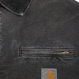 Close up of Black jacket, showing texture of the 100% cotton fabric